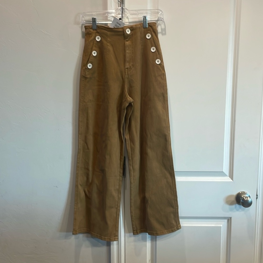 Sailor pants with button detail.